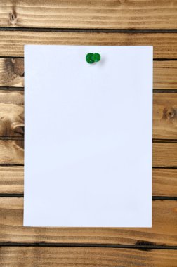 paper on wood background clipart