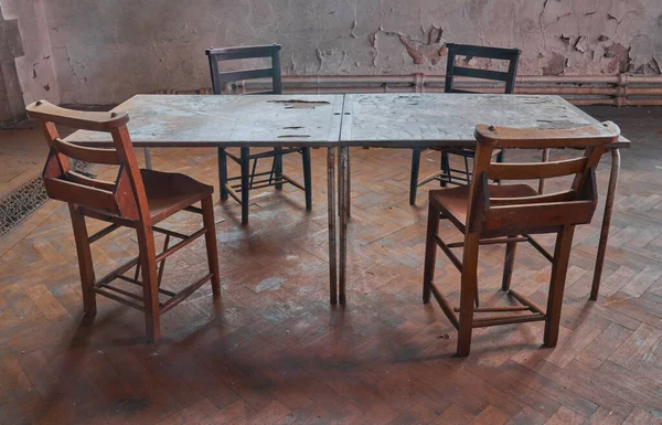 Abandoned grade 2 listed church and the echoing reminiscence of so many meetings and lost conversations that were held over these table and chairs