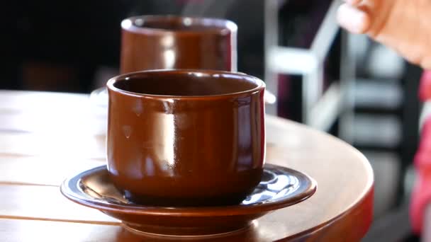 Woman drinks coffee. Cup close-up — Stock Video