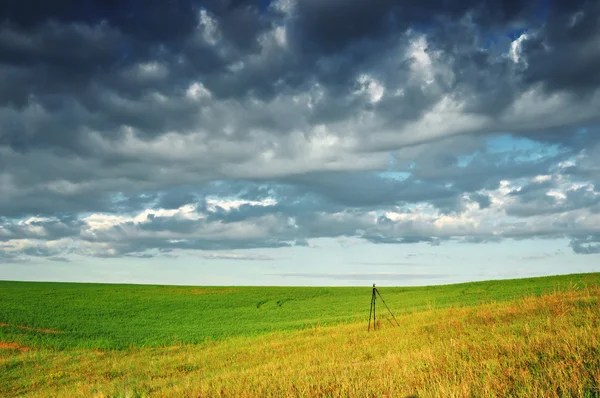 Clouds over the field — Stock Photo, Image