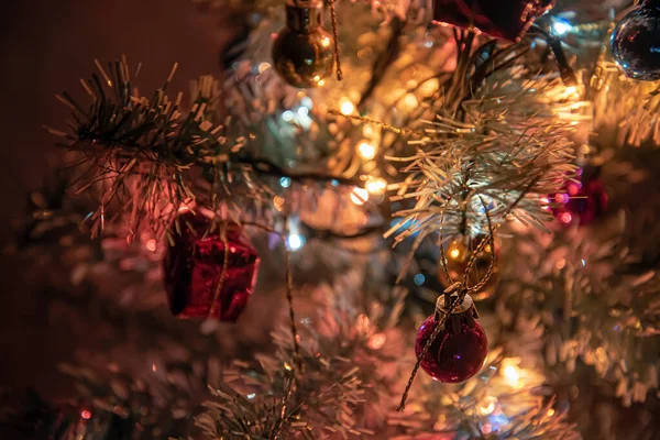 Christmas tree, branches with balls and lights — Stock Photo, Image