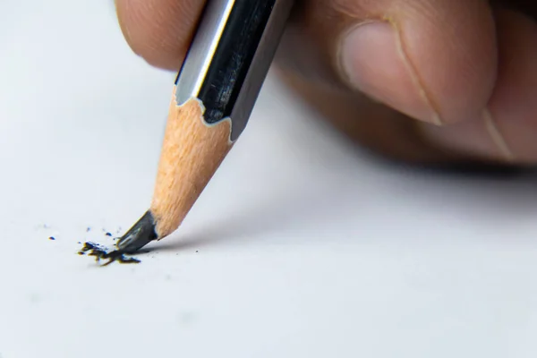 Fingers Holding Pencil Nib Broken While Writing White Paper — Stockfoto