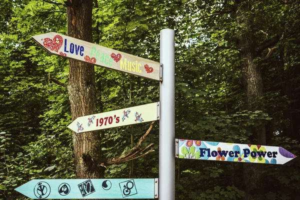 Flower power signpost — Stock Photo, Image
