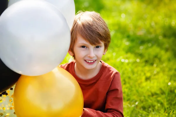 Portrait Red Haired Boy Colorful Gold Black Silver Balloons Sunny — Stock Photo, Image