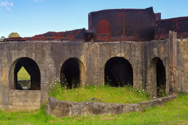 The ruins of the old Victoria mining battery in the Karangahake Gorge, New Zealand, dating back to the 1890s. This structure was a stand for cyanide tanks used to extract gold from ore