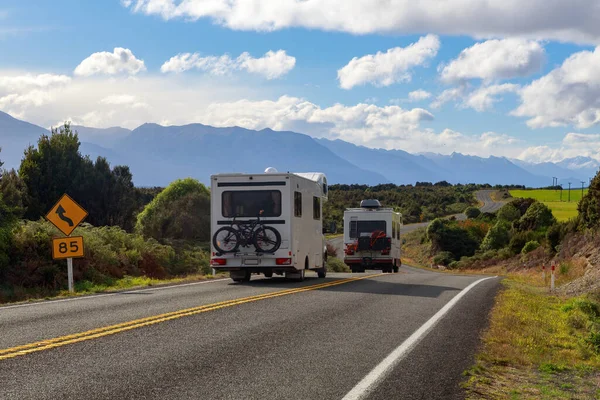 Recreational vehicles on the road between Te Anau and Milford Sound, Fiordland, New Zealand