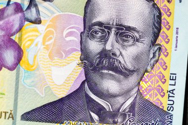 Ley banknotlarının detaylarına özen göster. Romanya lei banknotlarının makro detaylarını kapat, 100 lei izole edilmiş. Dünya para kavramı, enflasyon ve ekonomi kavramı