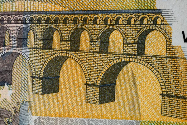 Selective focus on detail of euro banknotes. Close up macro detail of money banknotes, 5 euro isolated. World money concept, inflation and economy concept