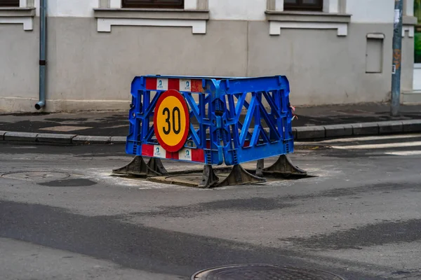 Speed limit, warning road signs located in working area. Bucharest, Romania, 2020 — Stock Image Speed Limit Warning Road Signs Located Working Area Bucharest Romania Stock Photo