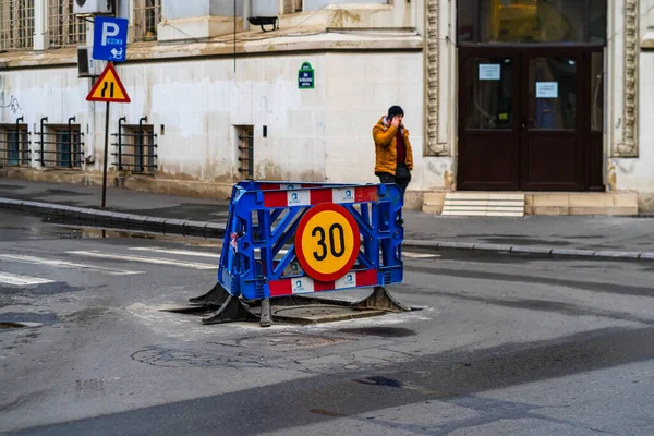 Speed limit, warning road signs located in working area. Bucharest, Romania, 2020 — Stock Image Speed Limit Warning Road Signs Located Working Area Bucharest Romania Royalty Free Stock Images