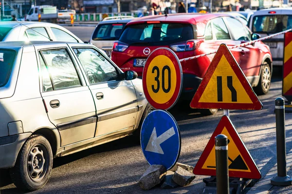 Speed limit, warning road signs located in working area. Bucharest, Romania, 2020 — Stock Image Speed Limit Warning Road Signs Located Working Area Bucharest Romania Royalty Free Stock Photos
