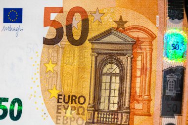 Avro banknotlarının detaylarına özen göster. Para banknotlarının makro detaylarını kapat, 50 Euro izole edilmiş. Dünya para kavramı, enflasyon ve ekonomi kavramı