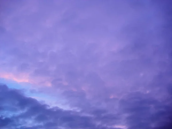 Dramatic colorful purple sky, beautiful pastel cloudy sky.