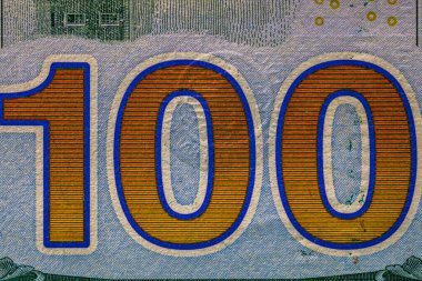 100 dolarlık banknotun detaylarına odaklan. Para banknotlarının makro detaylarını kapat..