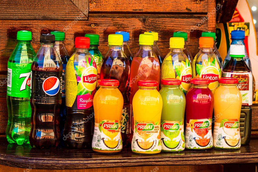Drinks, products for sale at local street market in Alba Iulia, Romania, 2021