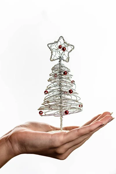 Hand Holding Small Silver Wire Christmas Tree Isolated White Background — Stock Photo, Image