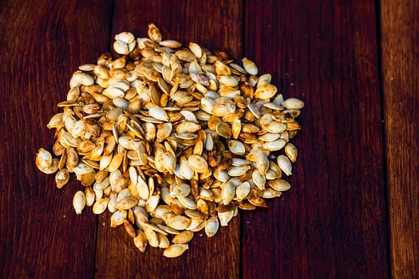 Roasted Salty Pumpkin Seeds Wooden Table — Stock Photo, Image