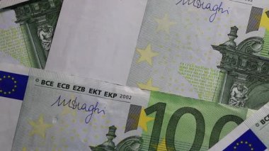 100 Euro 'luk banknotlar, Avrupa para birimi geçmişi. Finans kavramı için 100 Euro nakit para arkaplanı