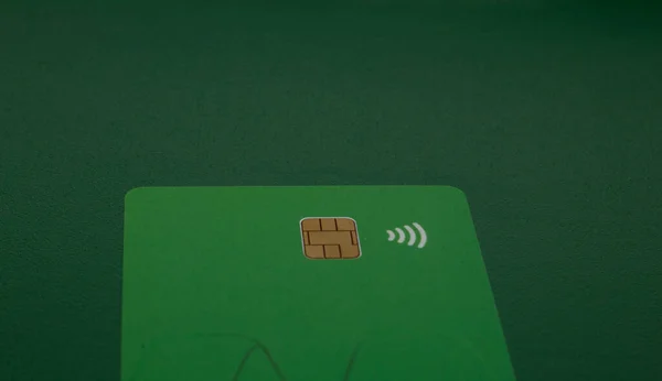 blank card with brown square chip symbol and a WiFi symbol concept of contactless payment as new normal after coronavirus pandemic outbreak