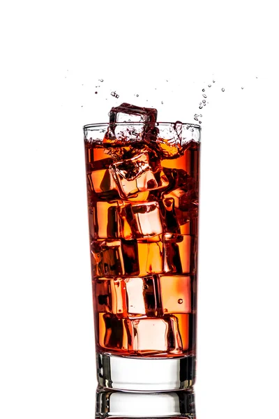 Ice splashing in cup of tea Royalty Free Stock Images