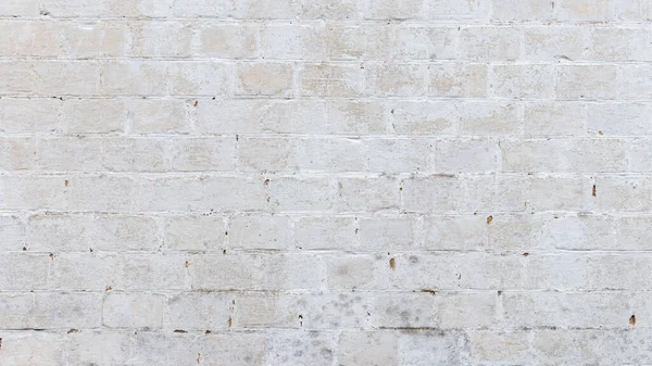 Beyaz tuğlalı arka plan. Eski beyaz bloklar. Kalitesiz duvar.