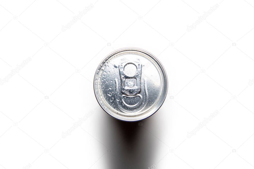 Aluminum can on a white background, with water drops, top view.
