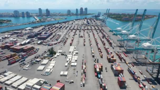 Panoramic drone view on cargo port with Miami beach cityscape and Atlantic ocean — Stock Video
