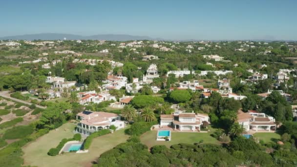 Albufeira, Portugal. Aerial view on a seaside town with low-rise architecture — Stock Video