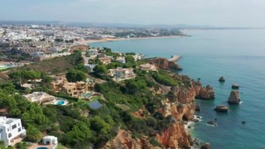 Albufeira, Portugal. Aerial panorama of coastal town surrounded by ocean waters