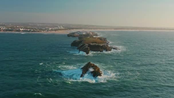 Baleal, Portugal, Europe. Drone footage of a coastal town with a mainland behind — Stock Video