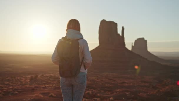 Silhouette calm relaxed female tourist traveling in wilderness western American — Stock Video