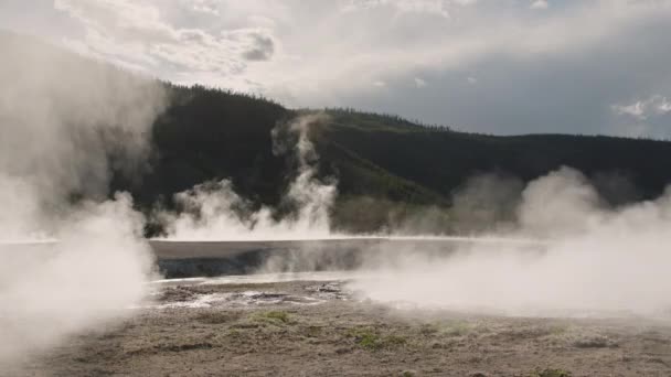 Hot Spring with thermal water hot steams in volcano Yellowstone National Park 4K — Stock Video