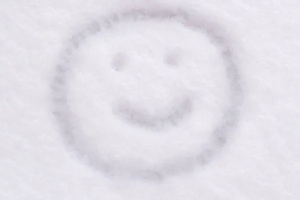 Śnieg Tekstury Zbliżenie Uśmiech Twarz Jest Rysowany — Zdjęcie stockowe