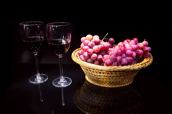 Glasses with wine and grapes — Stock Photo, Image