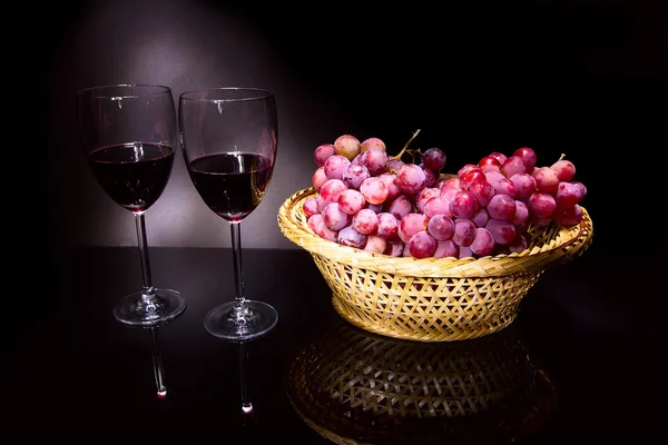 Glasses with wine and grapes — Stock Photo, Image