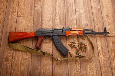 Kalashnikov assault rifles with ammunition  clipart