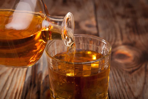 Bottle of whiskey and a glass — Stock Photo, Image