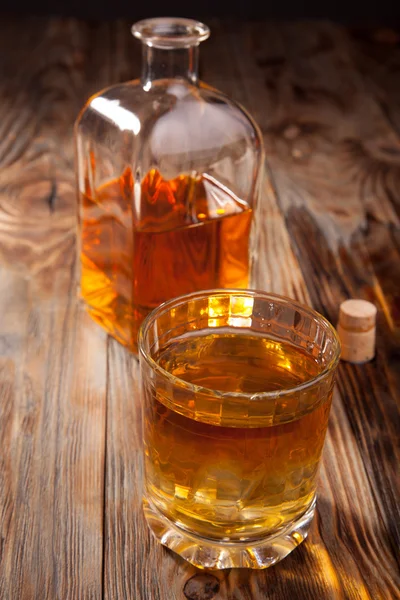 Bottle of whiskey and a glass — Stock Photo, Image