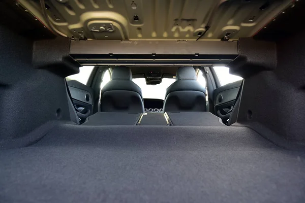 Empty trunk with rear seats folded of the passenger car