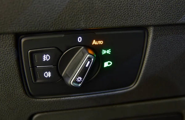 Closeup image of car lighting control switch