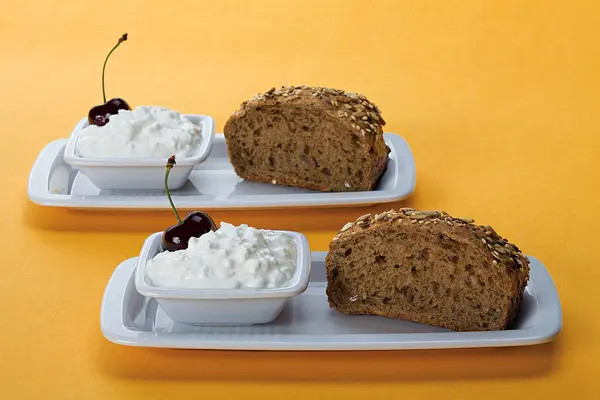 Nice and light breakfast. Loaf of bread and white cheese.