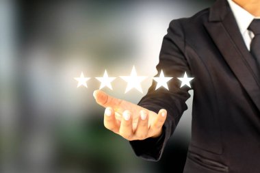 İşadamları beş yıldız tutuyor, sıralamalarını yükseltiyor veya en yüksek reytingleri, en iyi değerlendirmeleri ve sıralama fikirlerini yükseltiyorlar.