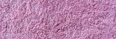 Uzun halı dokusu. Tüylü pembe liflerin soyut arkaplanı