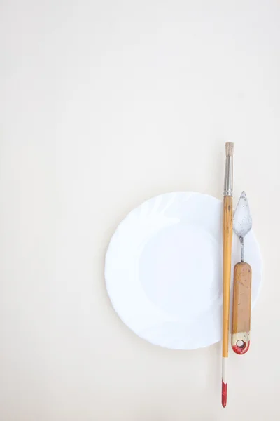 Painting Instruments on a Plate — Stock Photo, Image