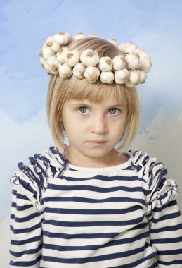 Little Girl with Garlic Wreath on her Head clipart