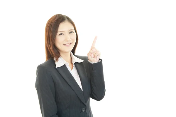 Business woman showing something on the pointing — Stock Photo, Image