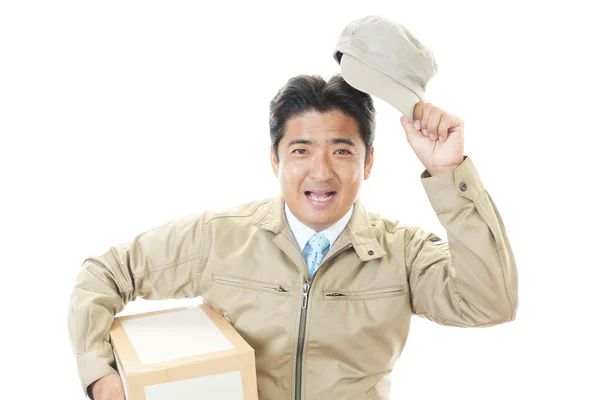 Smiling delivery man — Stock Photo, Image