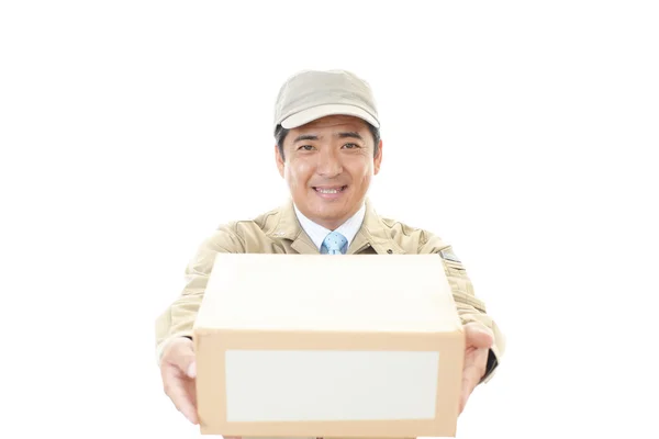 Smiling delivery man — Stock Photo, Image