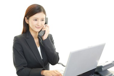 Telefonu olan iş kadını.