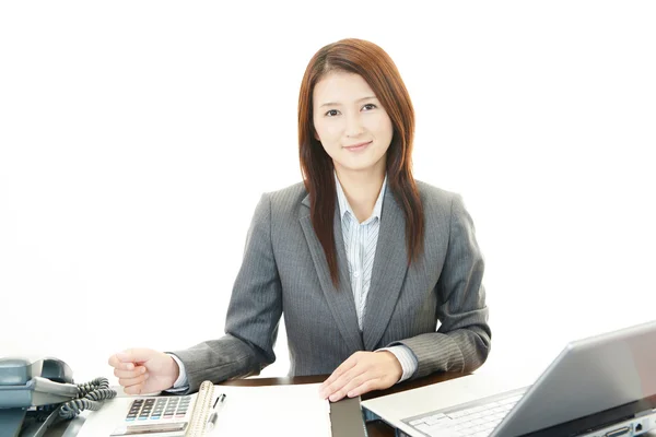 Business woman working on laptop — Stock Photo, Image